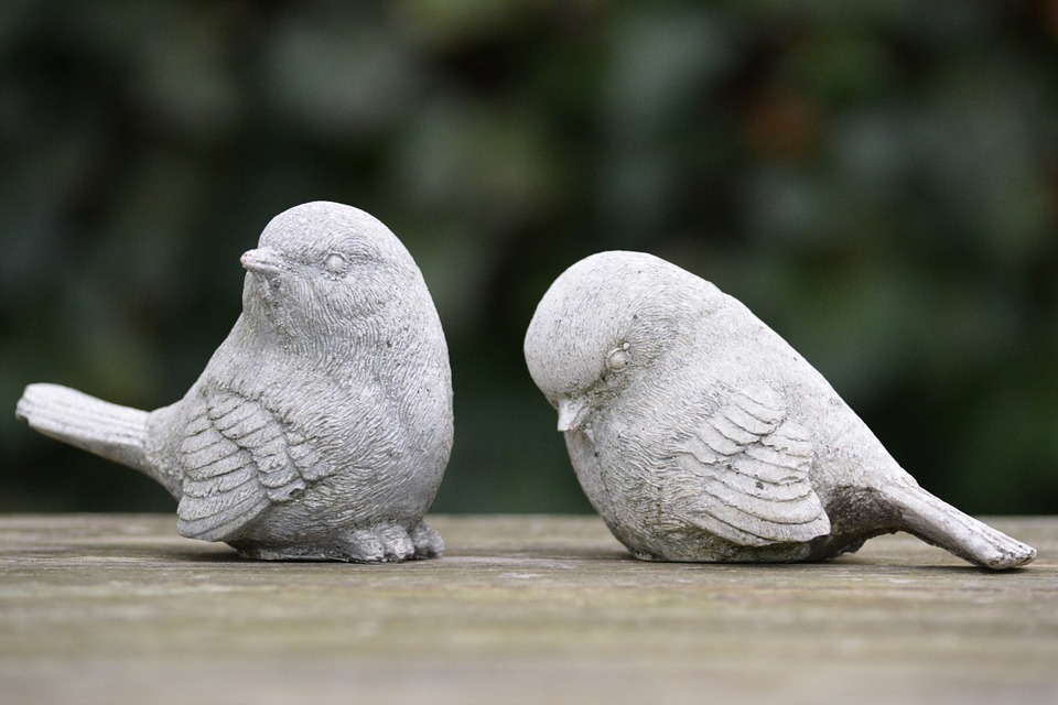 one ceramic bird rejecting another
