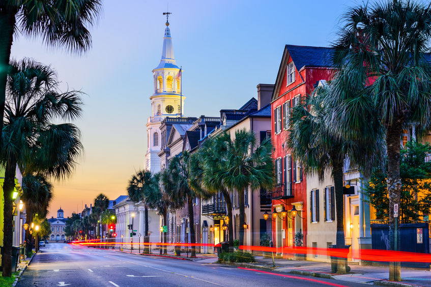 Charleston, South Carolina, USA cityscape in the historic French Quarter at twilight.