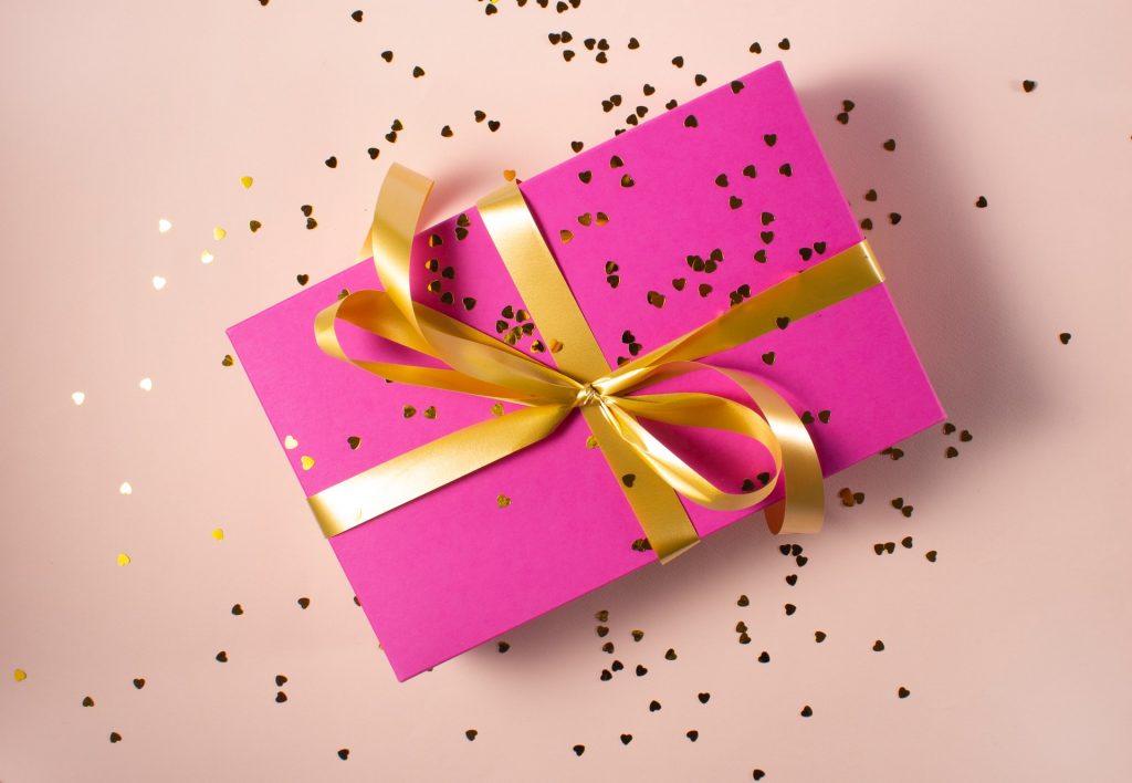 Pink present with gold ribbon