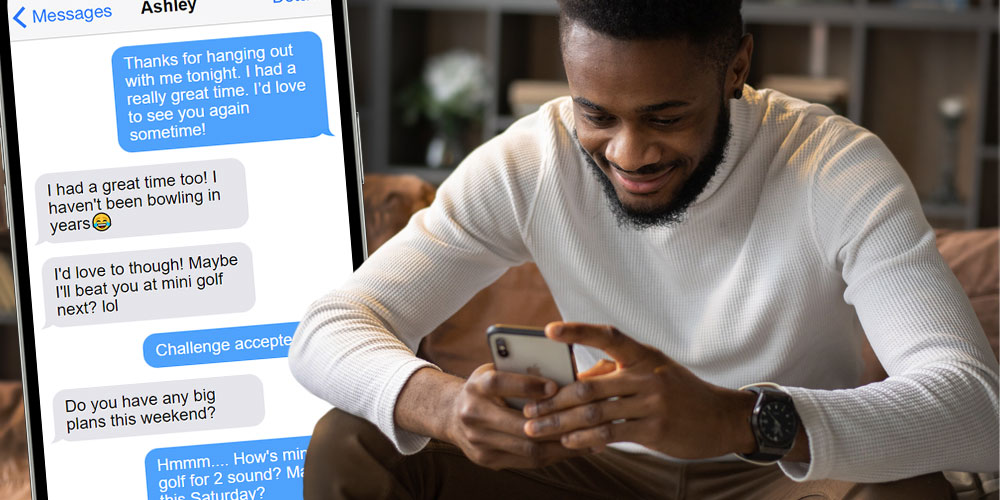 A Man Smiling While Texting After a First Date