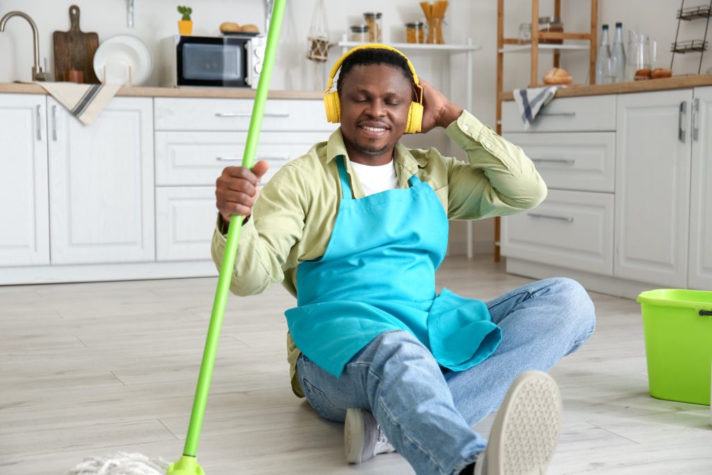 Man Getting His House Cleaned And Ready For His Date
